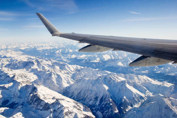 Flight Over The Snow Alps Stock Photo - Download Image Now - Airplane, Mountain, Winter - iStock