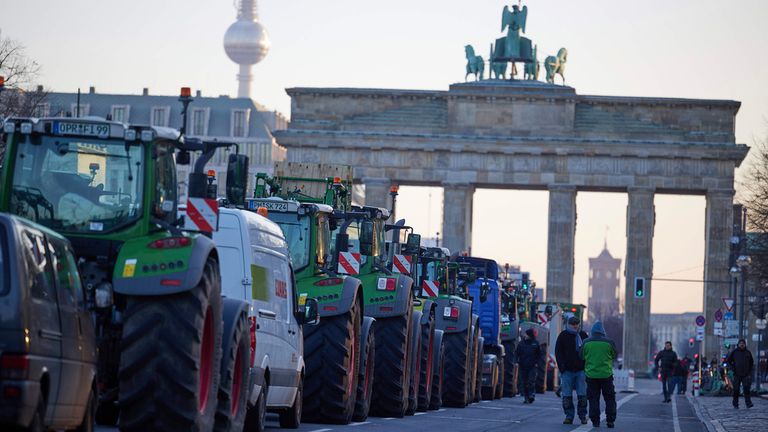 German farmers block roads in nationwide protest over diesel tax plans | World News | Sky News